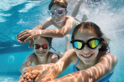 Kids swimming in pool